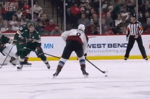 Hockey Game in Front of Nest Bend Ad