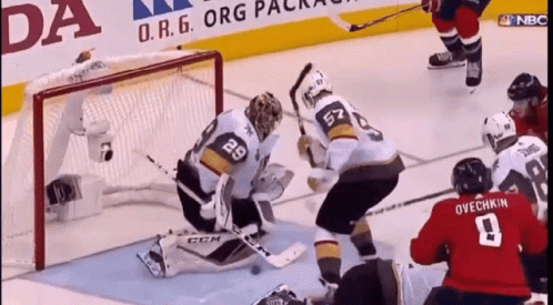 Hockey Game in Front of Org Pack Ad