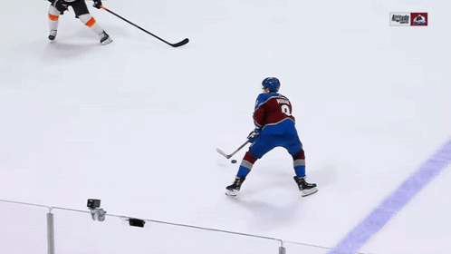 Hockey Game in Front of Pepsi Ad