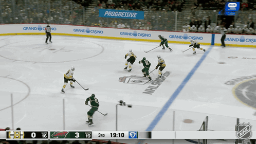 Hockey Game in Front of Progressive Banner