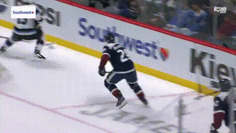 Hockey Game in Front of Southwest Ad