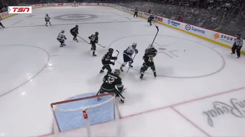 Hockey Game in Front of Supreme Ad