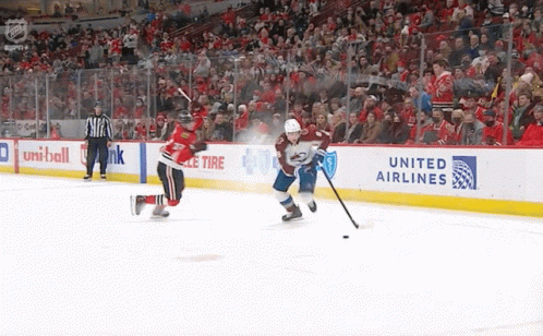 Hockey Game in Front of Toyota Banner