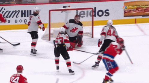 Hockey Game in Front of William Hill Ad