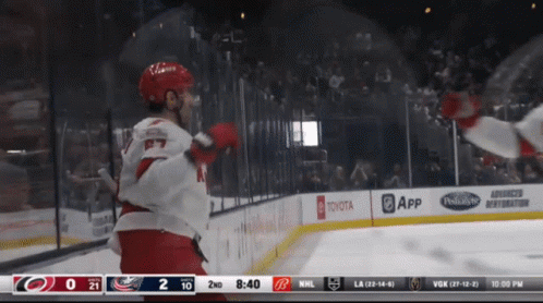 Hockey Game With Toyota and App Ads on Boards
