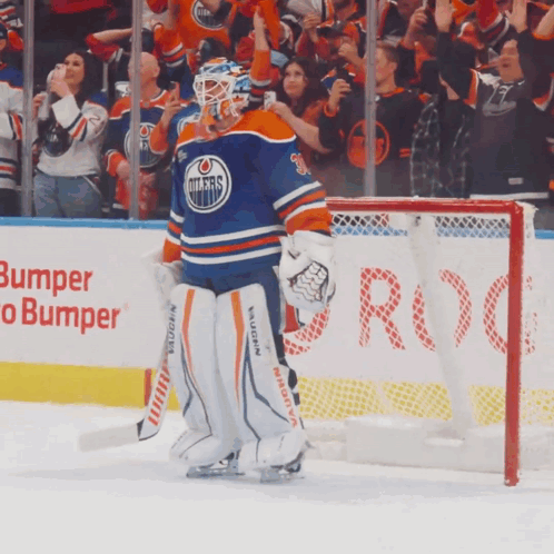 Hockey Goalie in Front of Banner