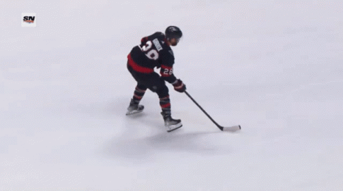 Hockey Goalie Kneeling in Number 36 Jersey