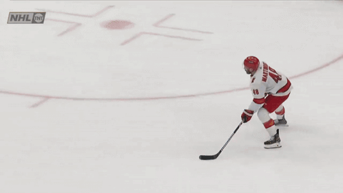 Hockey Goalie Kneeling on Ice
