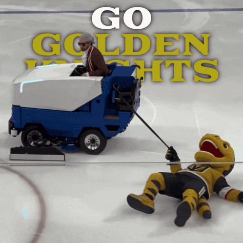 Hockey Mascot Laying On Ice Next To Machine Saying Go Golden Lights GIF