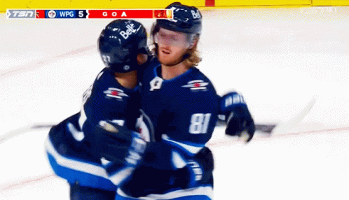 Hockey Player #81 Hugging Another Player