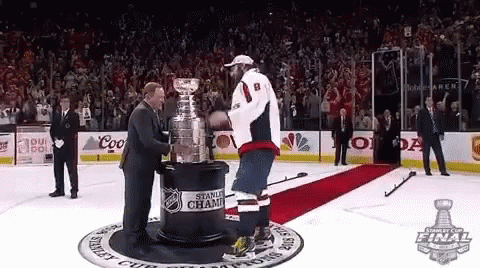 Hockey Player and Stanley Cup Final Trophy