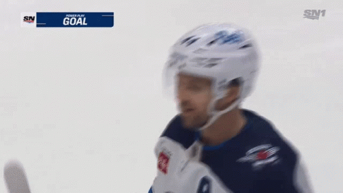 Hockey Player Celebrates Goal
