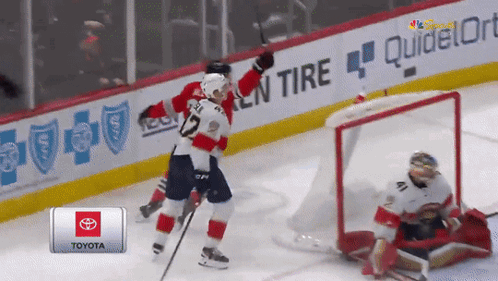 Hockey Player Celebrating Goal With Toyota Logo