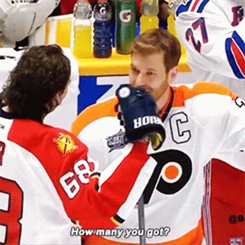 Hockey Player in 68 Jersey Talking to Another
