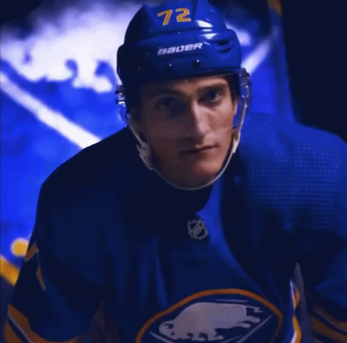 Hockey Player In Blue Jersey And Helmet GIF