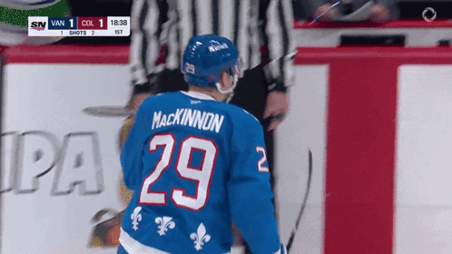 Hockey Player in Blue Jersey Number 29