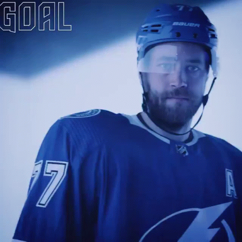 Hockey Player in Blue Jersey Number 7