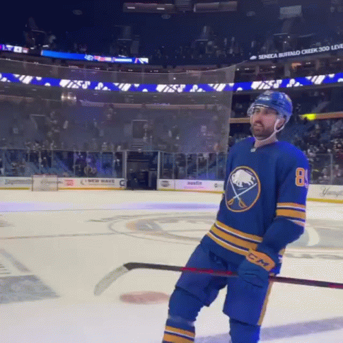 Hockey Player in Blue Jersey Number 80