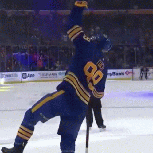 Hockey Player In Blue Jersey Number 90 GIF