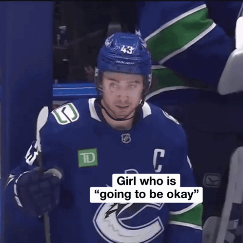 Hockey Player in Blue Jersey with C