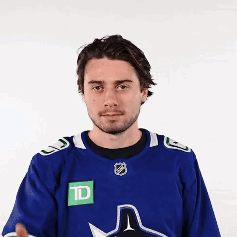 Hockey Player in Blue Jersey with TD Logo