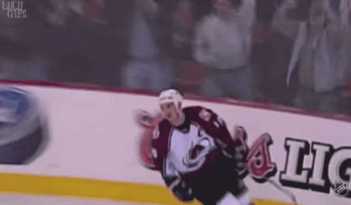 Hockey Player in Colorado Avalanche Jersey Skating