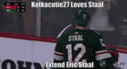 Hockey Player in Green Jersey Number 12