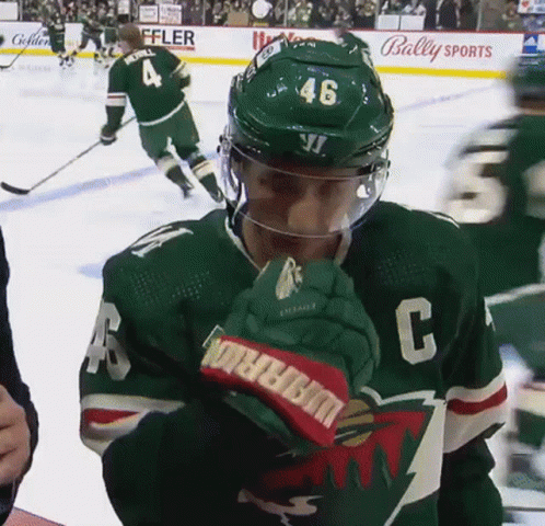 Hockey Player in Green Jersey Number 46