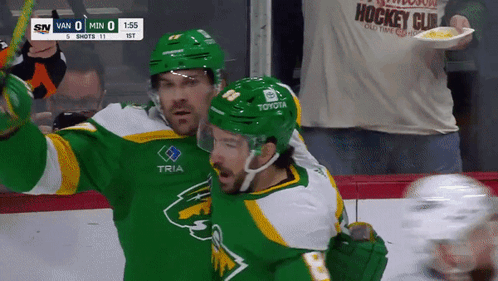 Hockey Player in Green Jersey Tria