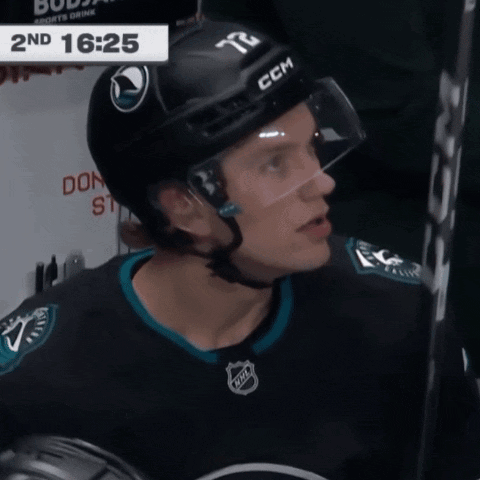 Hockey Player In Helmet Number 72 GIF