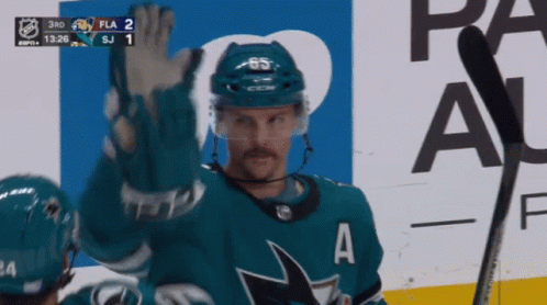 Hockey Player in Jersey Saying A