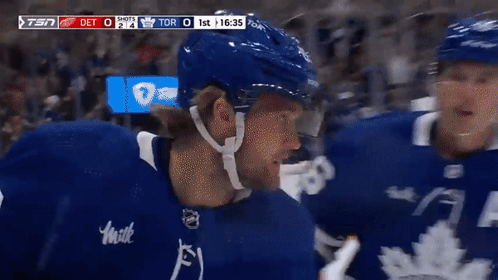 Hockey Player in Jersey Saying Milk on Sleeve