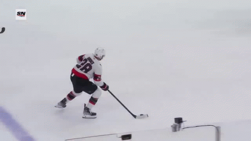 Hockey Player in Jersey With C