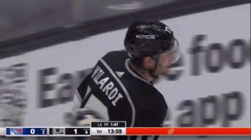 Hockey Player in Kings Helmet