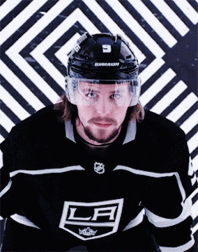 Hockey Player in LA Jersey and Helmet