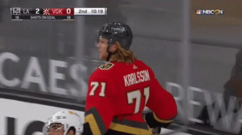 Hockey Player in Number 71 Jersey on Ice