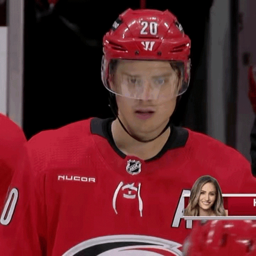 Hockey Player in Red Jersey Number 20