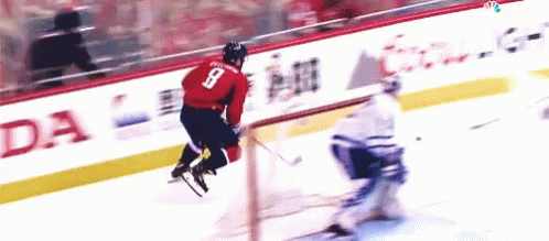 Hockey Player in Red Jersey Number 8