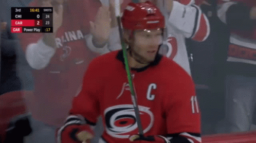 Hockey Player in Red Jersey with Letter C