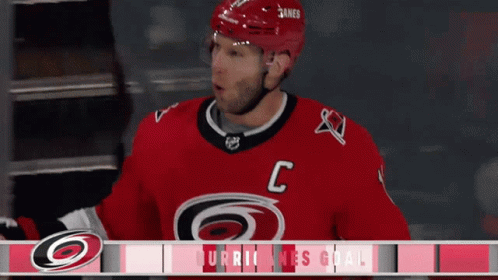Hockey Player in Red Jersey with Letter C
