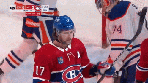 Hockey Player in Red White and Blue Jersey