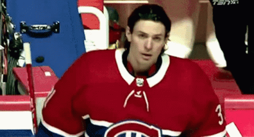 Hockey Player in Red White and Blue Jersey