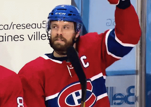 Hockey Player In Red White And Blue Jersey With Letter C GIF
