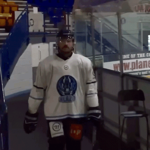 Hockey Player In White Jersey With Number 111 On Knee GIF