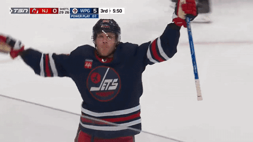 Hockey Player Jets Jersey Celebrating Arms Raised