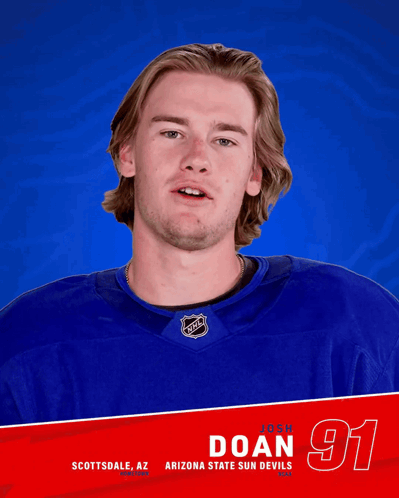 Hockey Player Josh Doan in Blue Shirt
