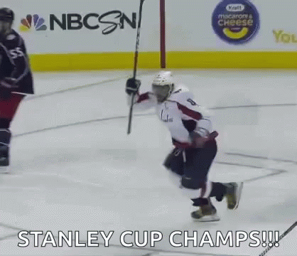 Hockey Player Kneeling Down Holding Stick