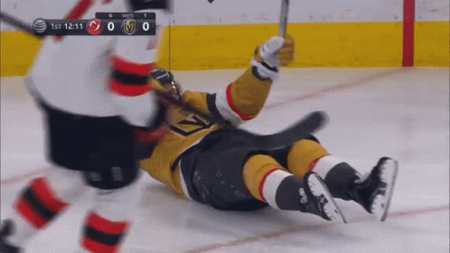 Hockey Player Lying On Ice GIF