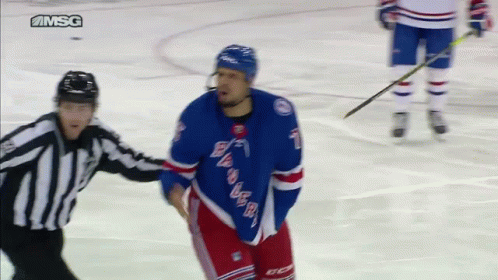 Hockey Player Number 1 Talking to Referee on Ice