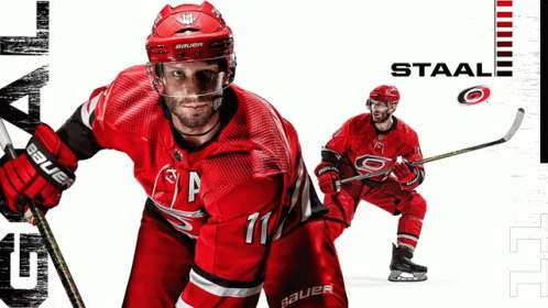 Hockey Player Number 11 Holding Hockey Stick